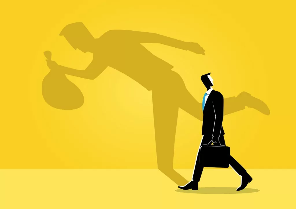 Cartoon Graphic of a man at work casting a shadow of a thief stealing a bag of money or goods; What is Article 121 Larceny and Wrongful Appropriation?